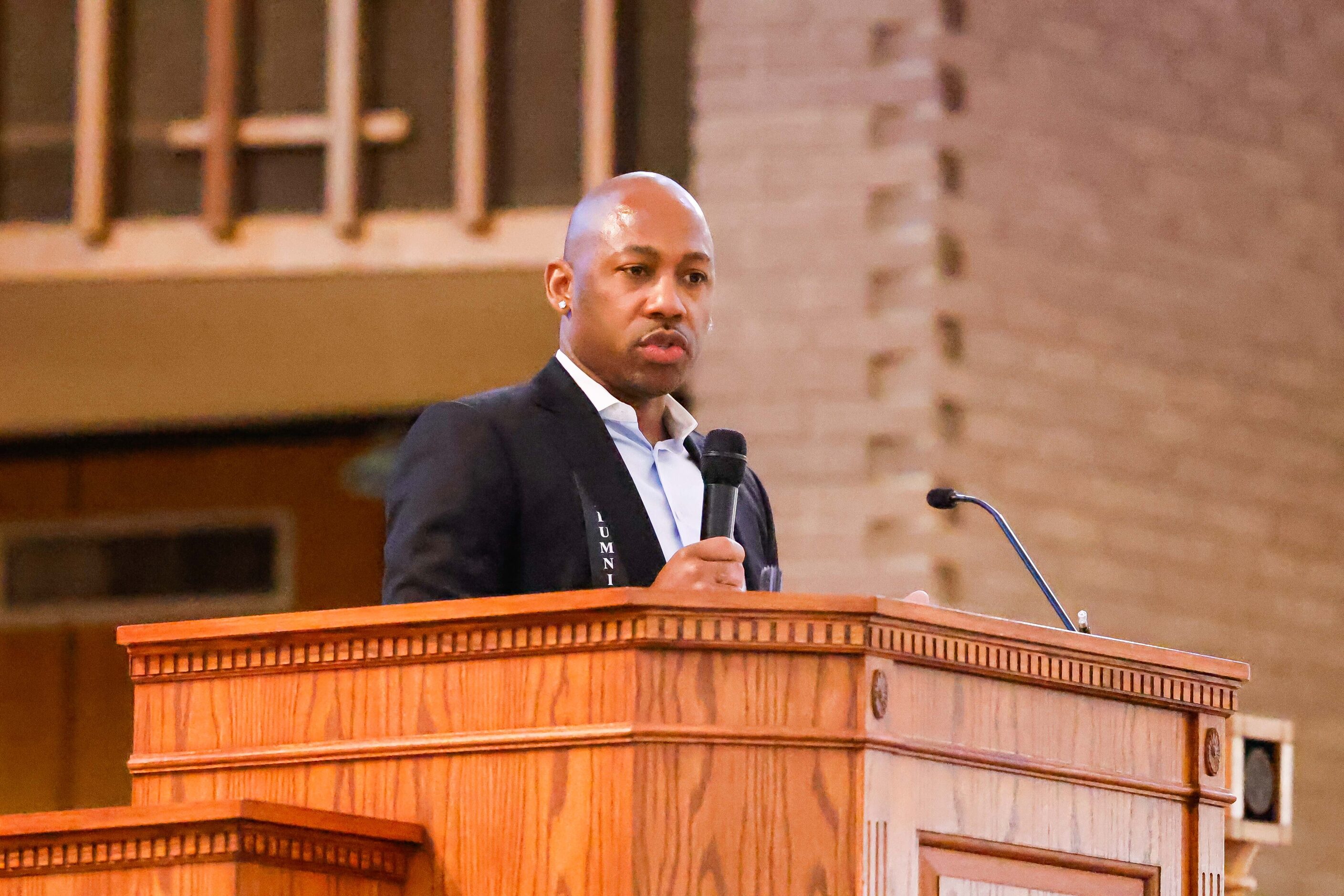 '00 alumni Kevin Kelly adresses attendees during the Paul Quinn College Founder's Day...