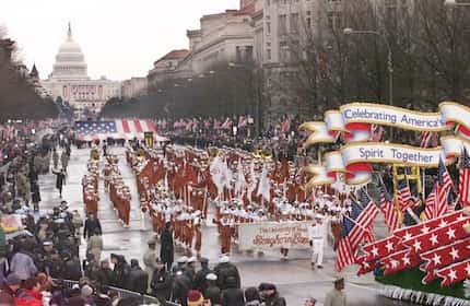 The University of Texas Longhorn Band comes down Pennsylvania Avenue from the U.S. Capitol...