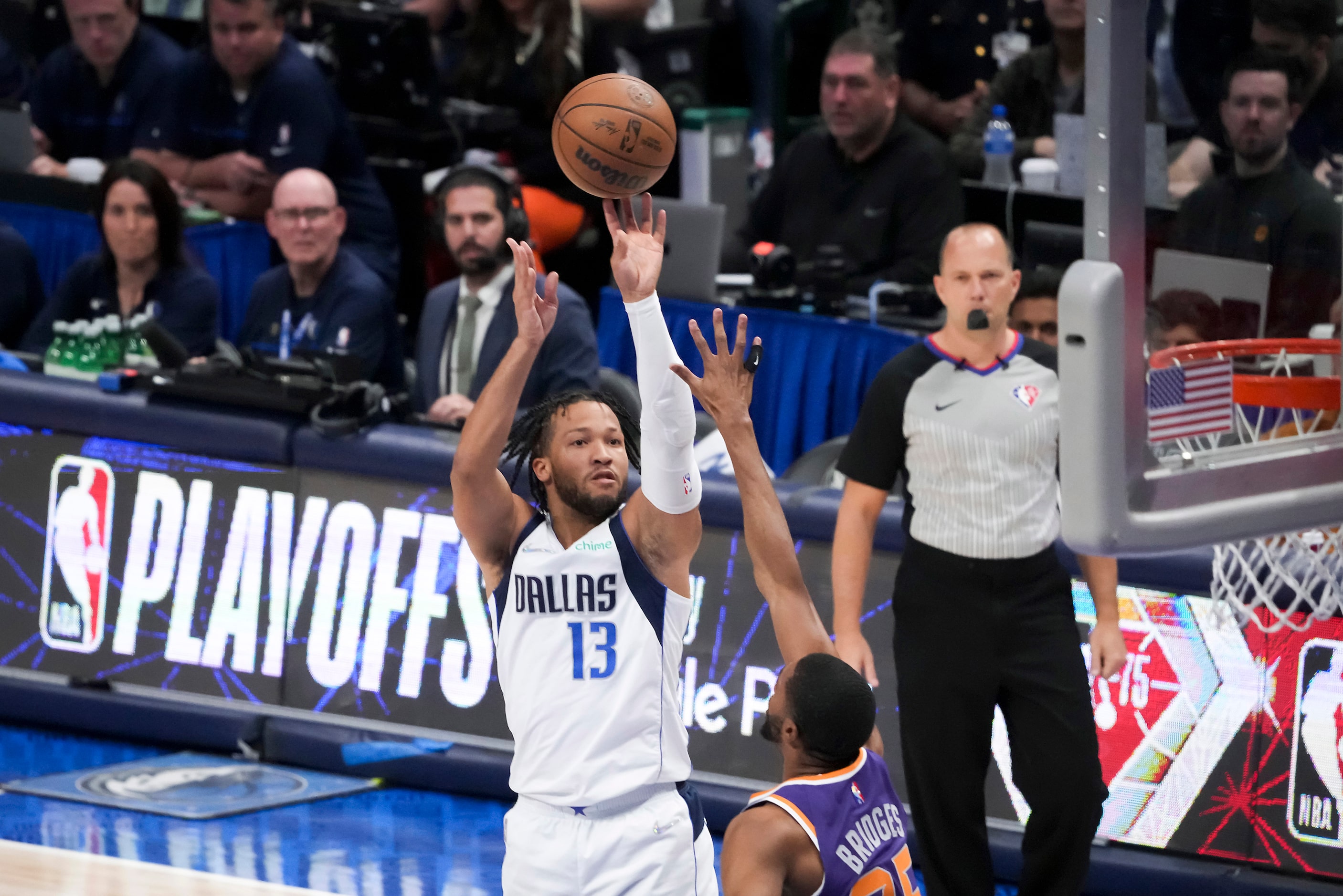 Dallas Mavericks guard Jalen Brunson (13) shoots over Phoenix Suns forward Mikal Bridges...