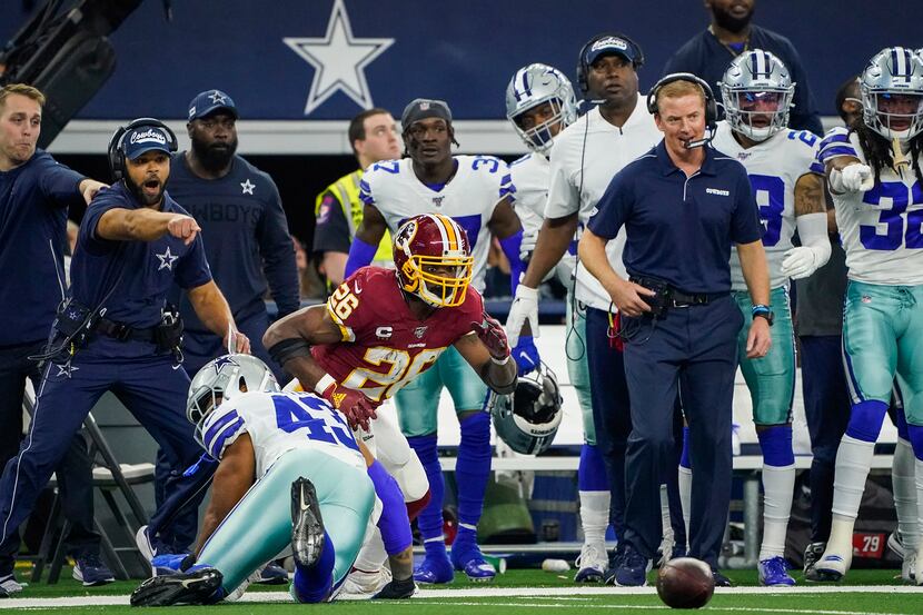 Washington Redskins running back Adrian Peterson (26) fumbles on a hit by Dallas Cowboys...