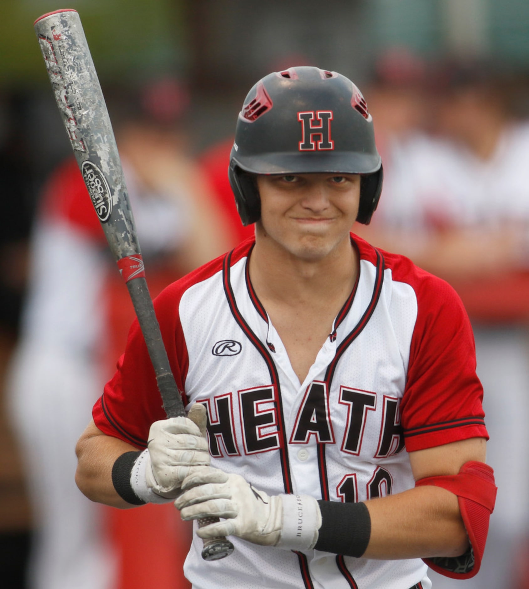 Rockwall Heath infielder Sam Crowell (10) grimaces after a called strike while batting in...