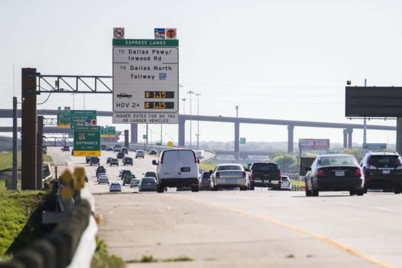Motorists drive east on LBJ Freeway at the entrance of the TEXpress toll lanes just west of...