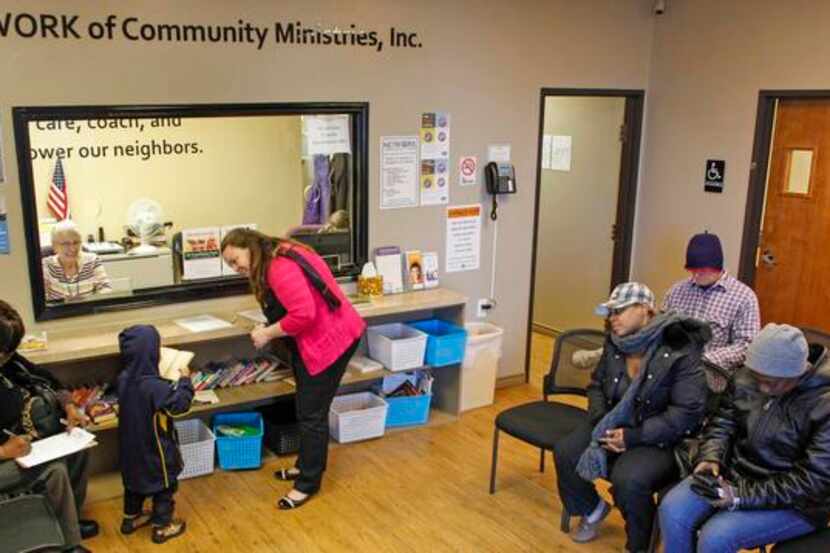 In this file photo, clients wait in the lobby at Network of Community Ministries in...