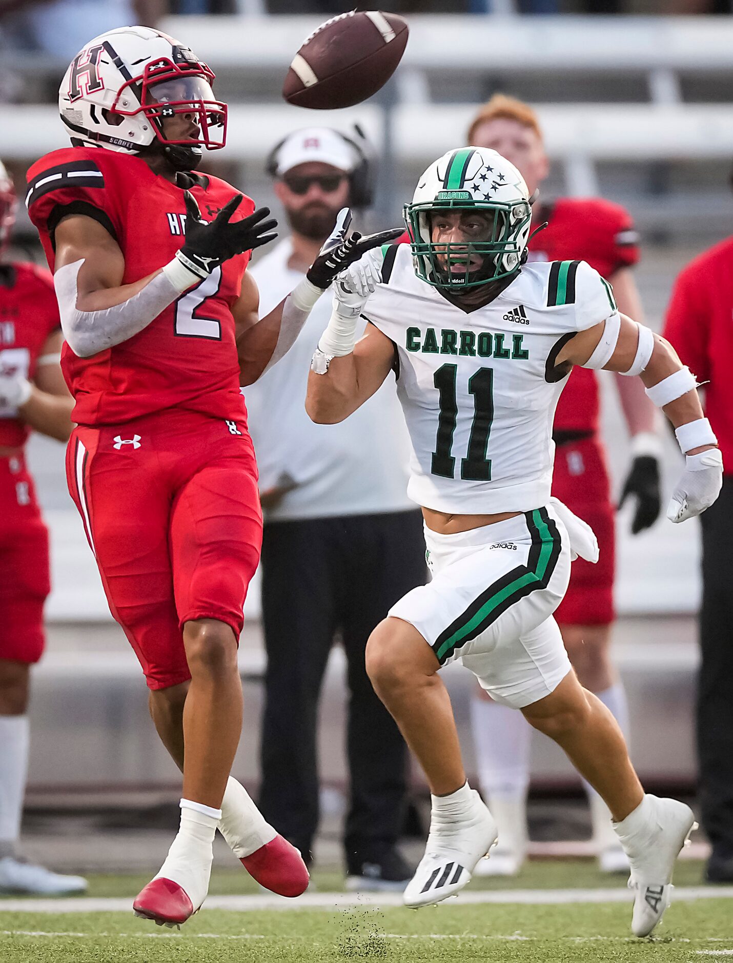 Rockwall-Heath wide receiver Jordan Nabors (2) hauls in a 51-yard pass as Southlake Carroll...