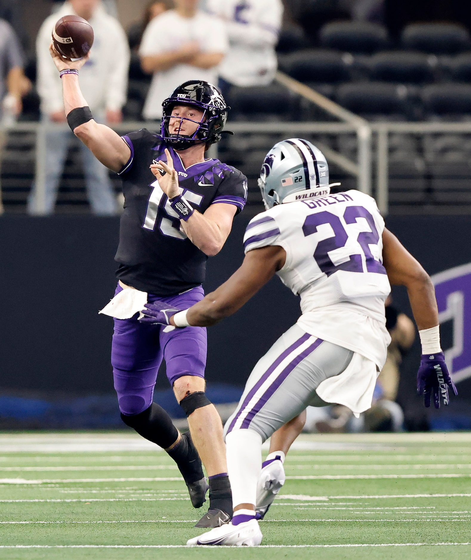 TCU Horned Frogs quarterback Max Duggan (15) fires a pass downfield against Kansas State...