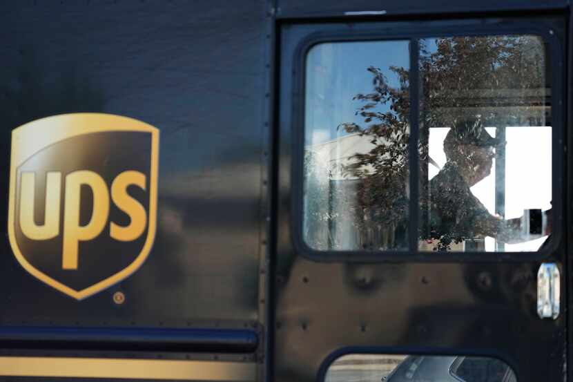 A UPS truck makes deliveries in Northbrook, Ill.