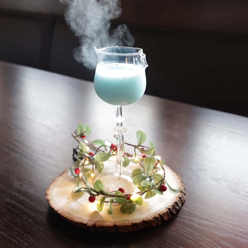 The Azure Elixir gets dusted with a powdered garnish at Mockingbird Station's JingHe...
