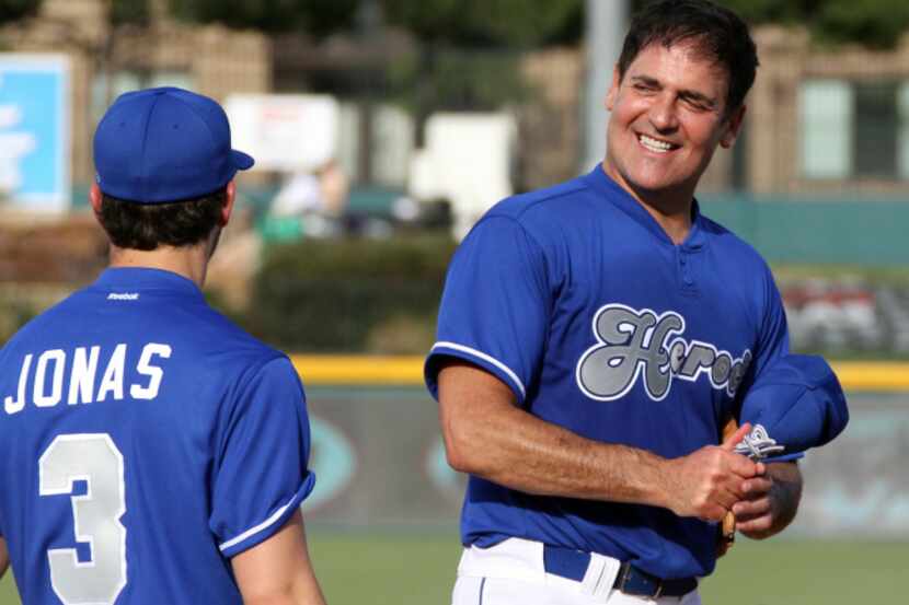 Mark Cuban, shown here at one of Dirk Nowitzki's Heroes Celebrity Baseball Games, believes...