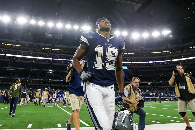 Dallas Cowboys wide receiver Amari Cooper (19) walks off the field following the Cowboys...