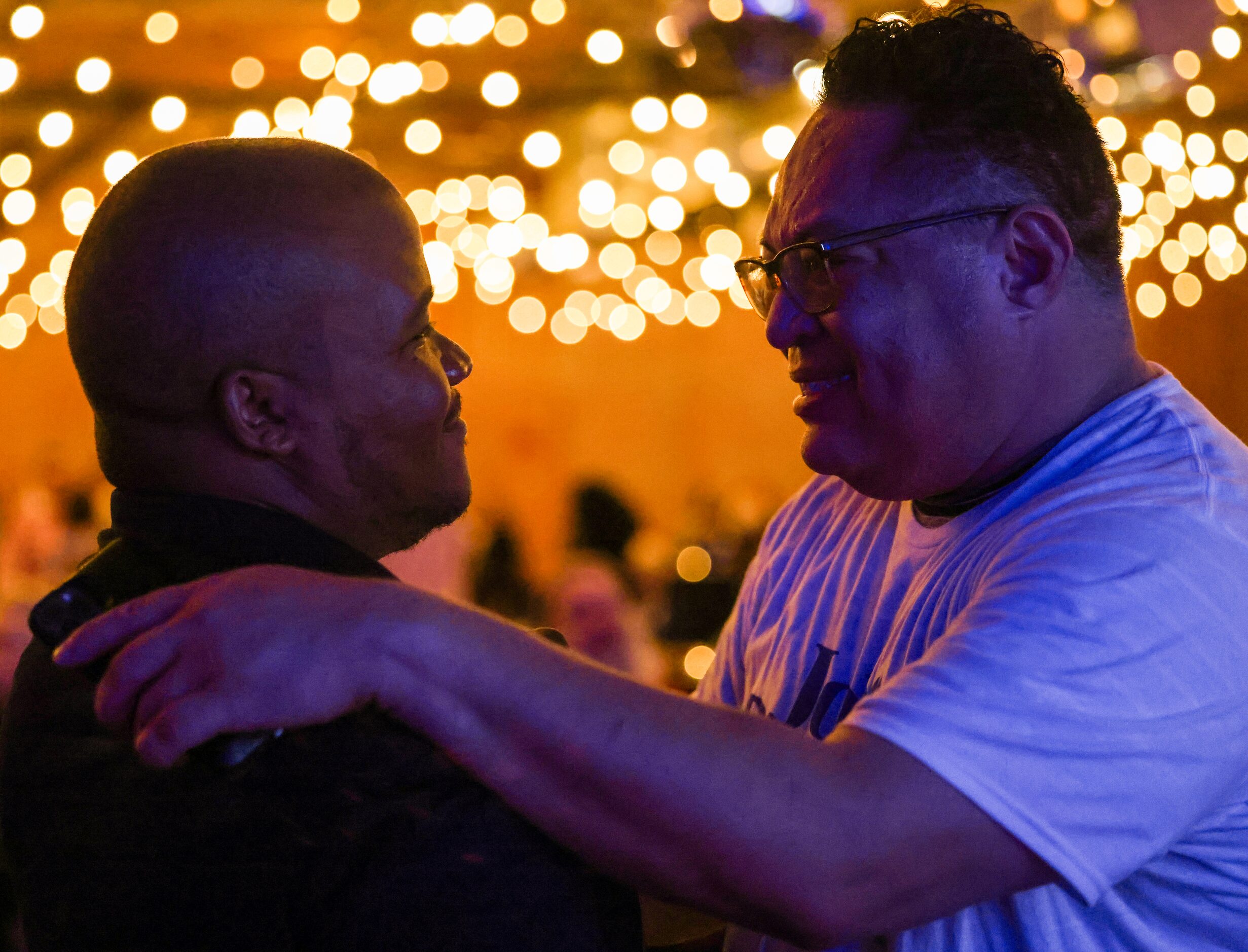 Venton Jones (left) is held by City of Dallas deputy mayor pro tem Omar Narvaez after Jones’...