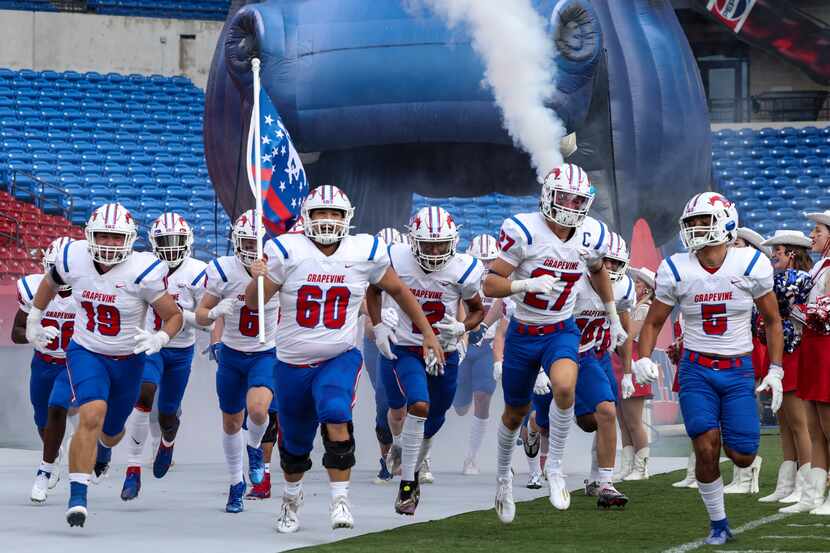 Grapevine players run on the field at Toyota Stadium before a game against Frisco Wakeland...