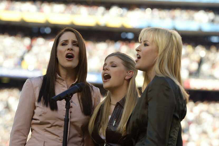 The Dixie Chicks perform the national anthem before the start of Super Bowl XXXVII between...