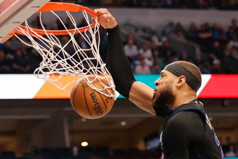Dallas Mavericks center Daniel Gafford (21) dunks during the second half of an NBA...