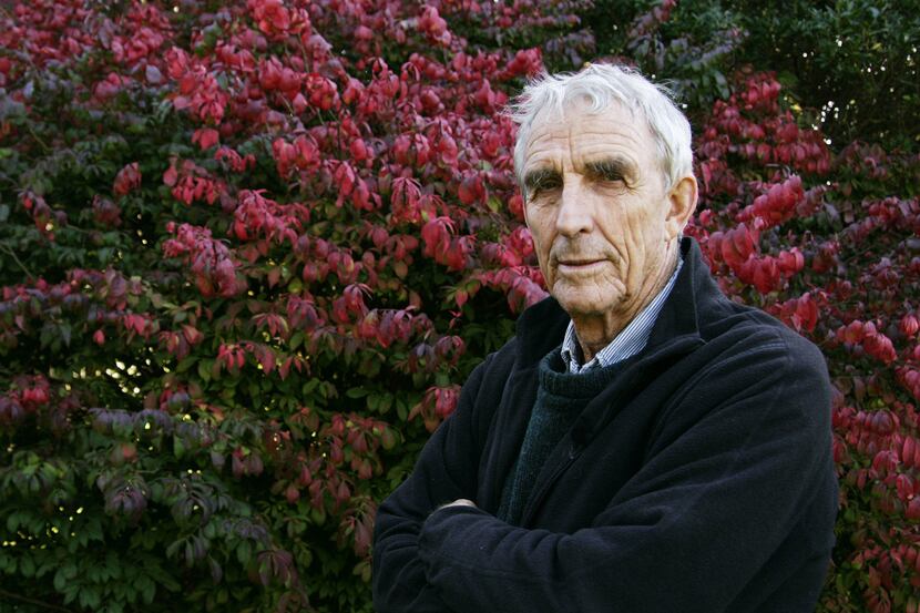 FILE - Writer Peter Matthiessen stands in the yard of his house in Sagaponack, N.Y. in this...