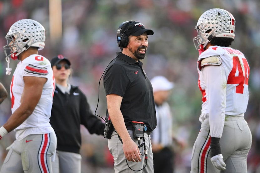 Ohio State head coach Ryan Day smiles during the first half in the quarterfinals of the Rose...