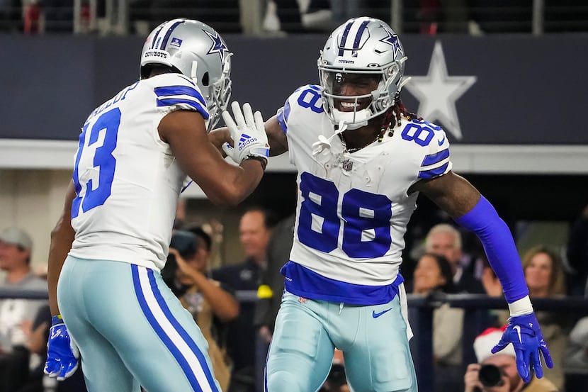 Dallas Cowboys wide receiver CeeDee Lamb (88) celebrates a touchdown catch with wide...