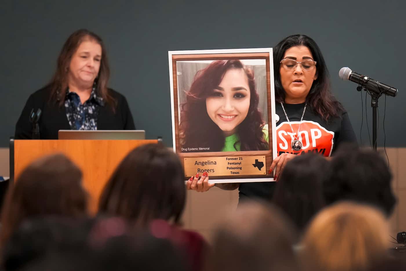 Christina Peña holds a photo of her daughter, Angelina Rogers, who died of fentanyl...