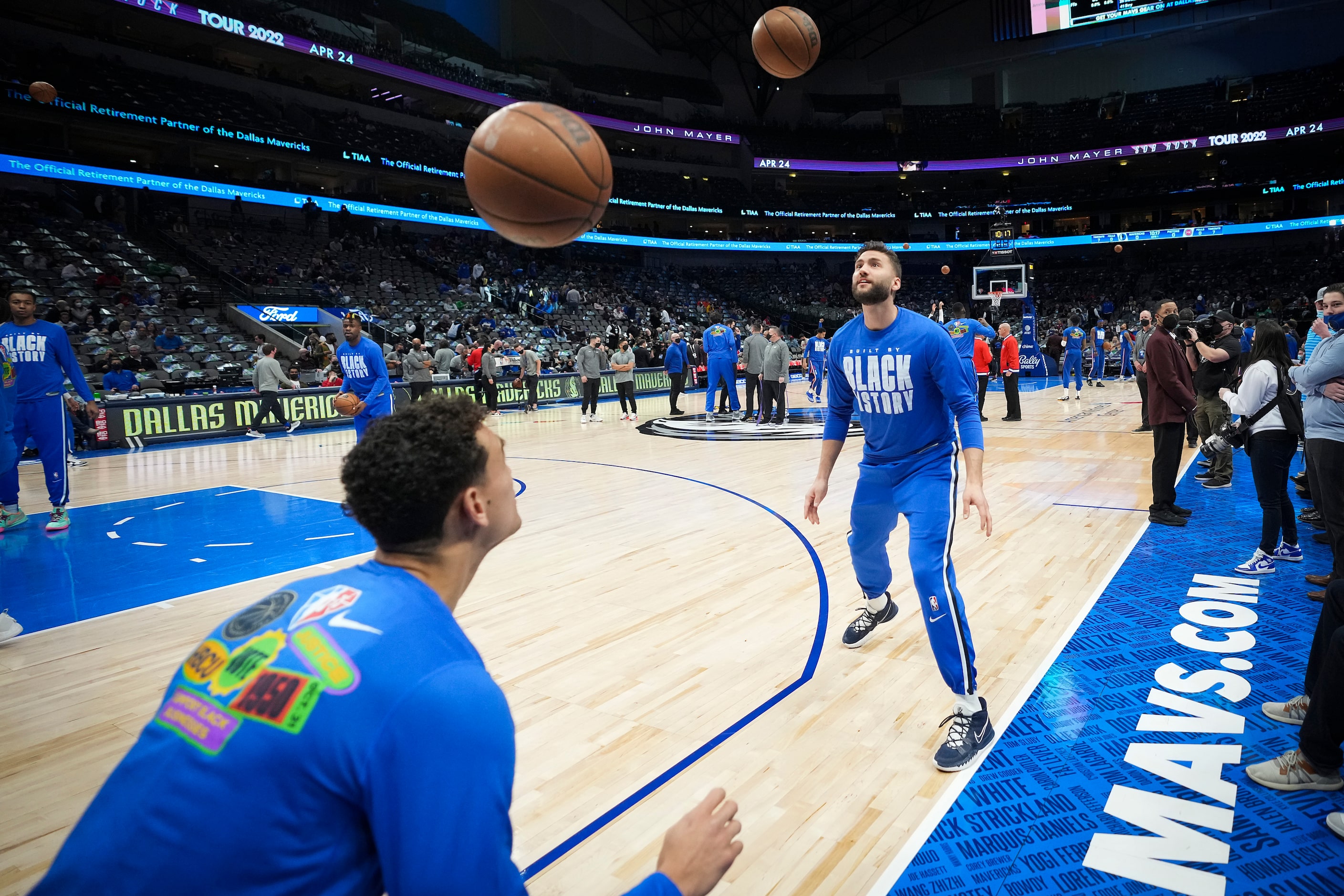 Dallas Mavericks center Dwight Powell (left) and forward Maxi Kleber head balls back and...