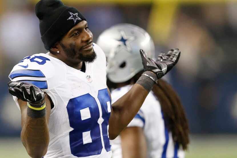 Dallas Cowboys wide receiver Dez Bryant (88) shrugs his shoulders in the direction of the...