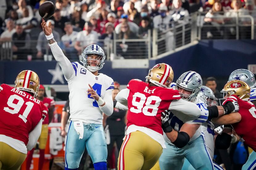 Dallas Cowboys quarterback Dak Prescott (4) throws a touchdown pass to wide receiver Amari...