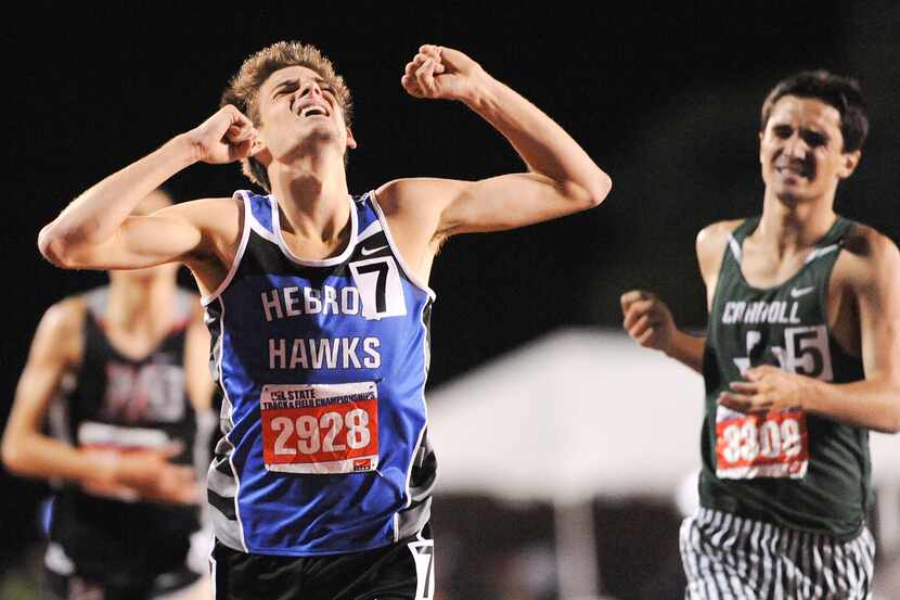 Hebron's Robert Domanic, left, celebrates a win in the boys 1600 meter race while Southlake...