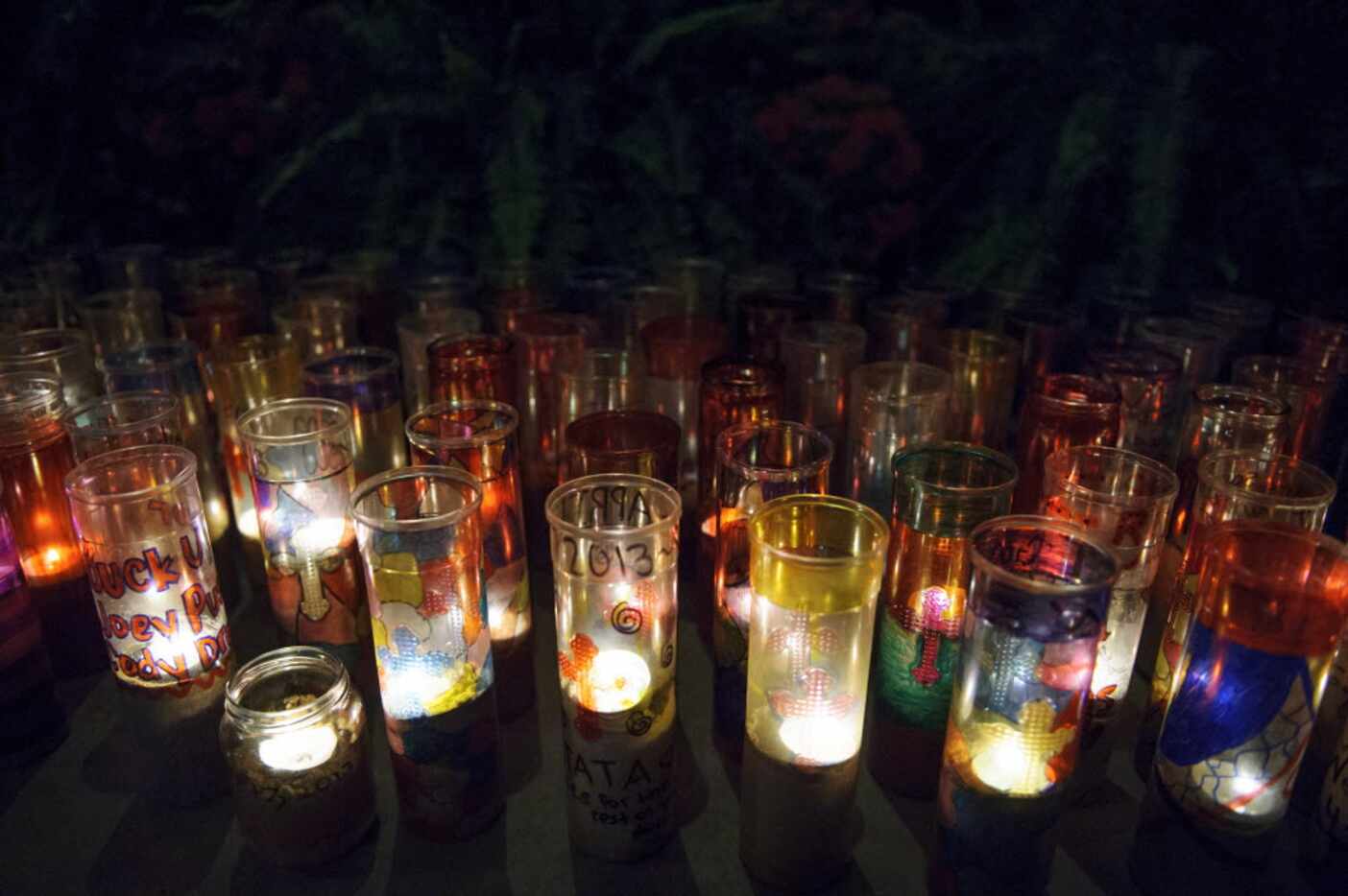 Decorated candles were lighted during a memorial ceremony in 2014 on the one-year...