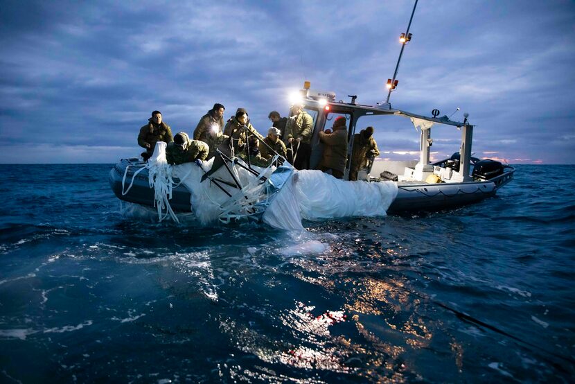 This image provided by the U.S. Navy shows sailors assigned to Explosive Ordnance Disposal...