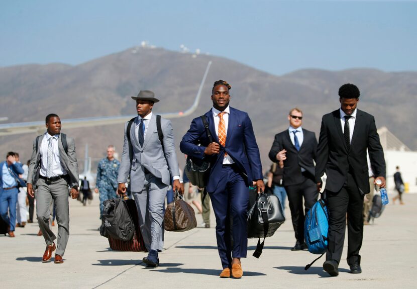 Dallas Cowboys defensive end Taco Charlton (L-R, beginning with 2nd from left), Dallas...