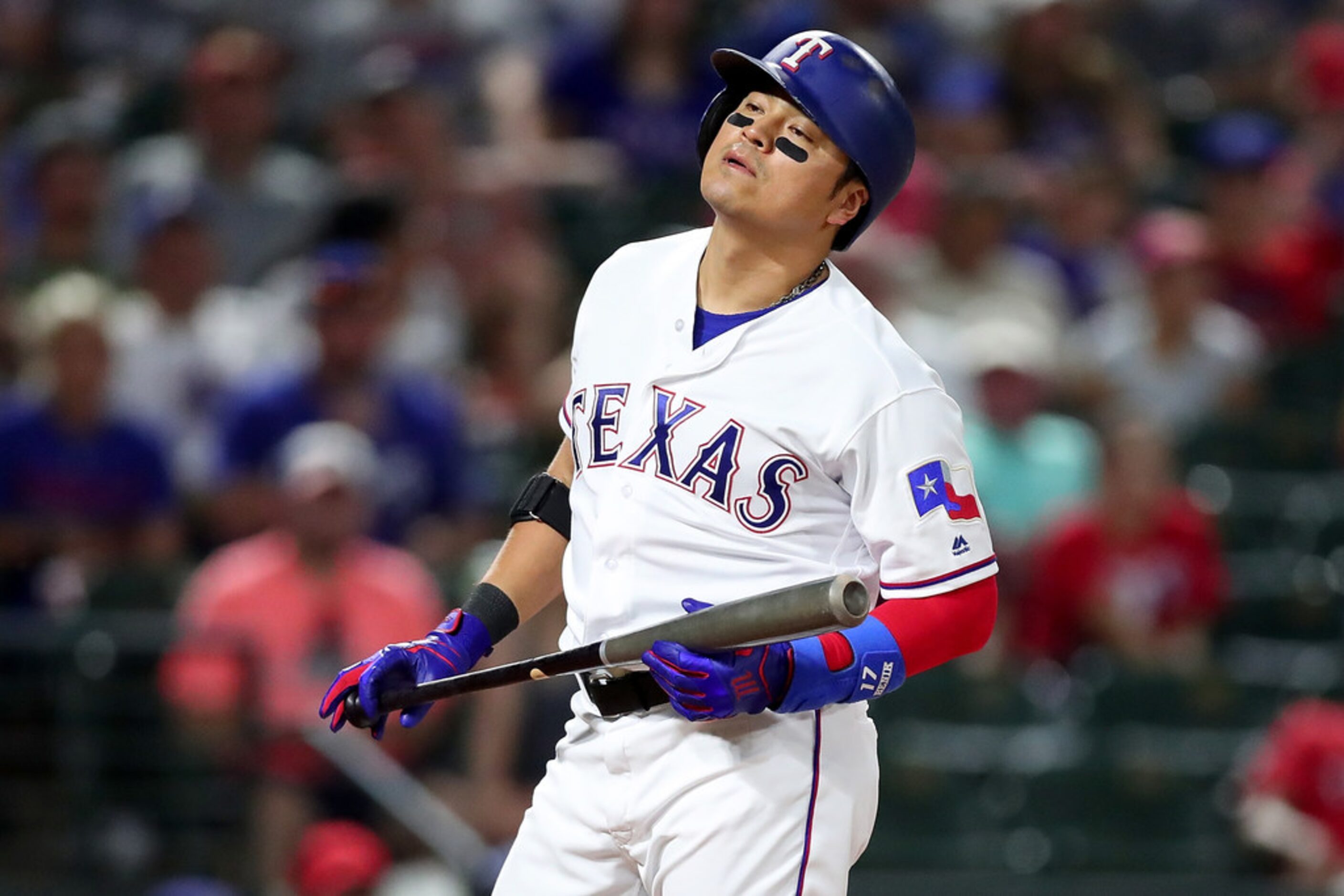 ARLINGTON, TX - JULY 23:  Shin-Soo Choo #17 of the Texas Rangers reacts after walking...