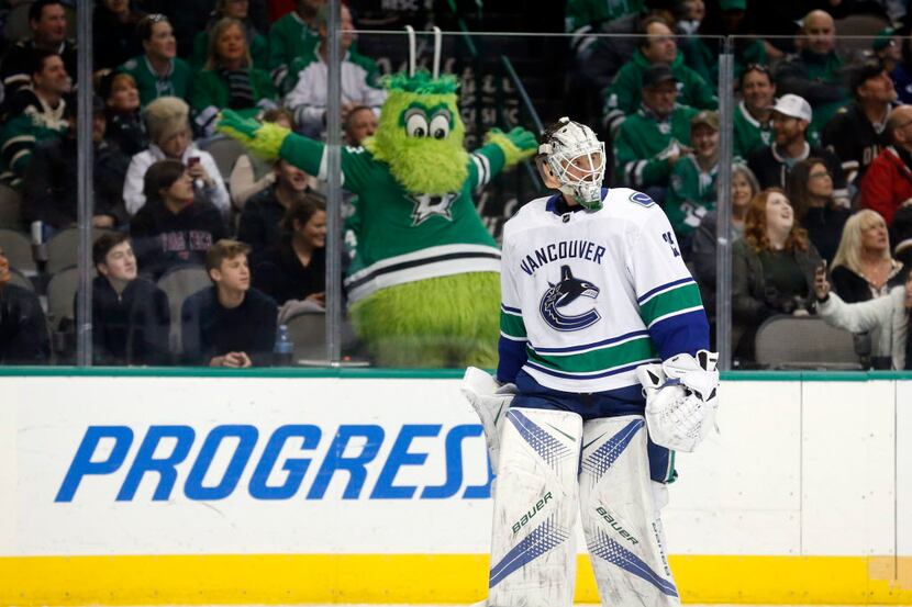 Dallas Stars mascot Victor E Green reacts to a call of no goal, after video review, by the...