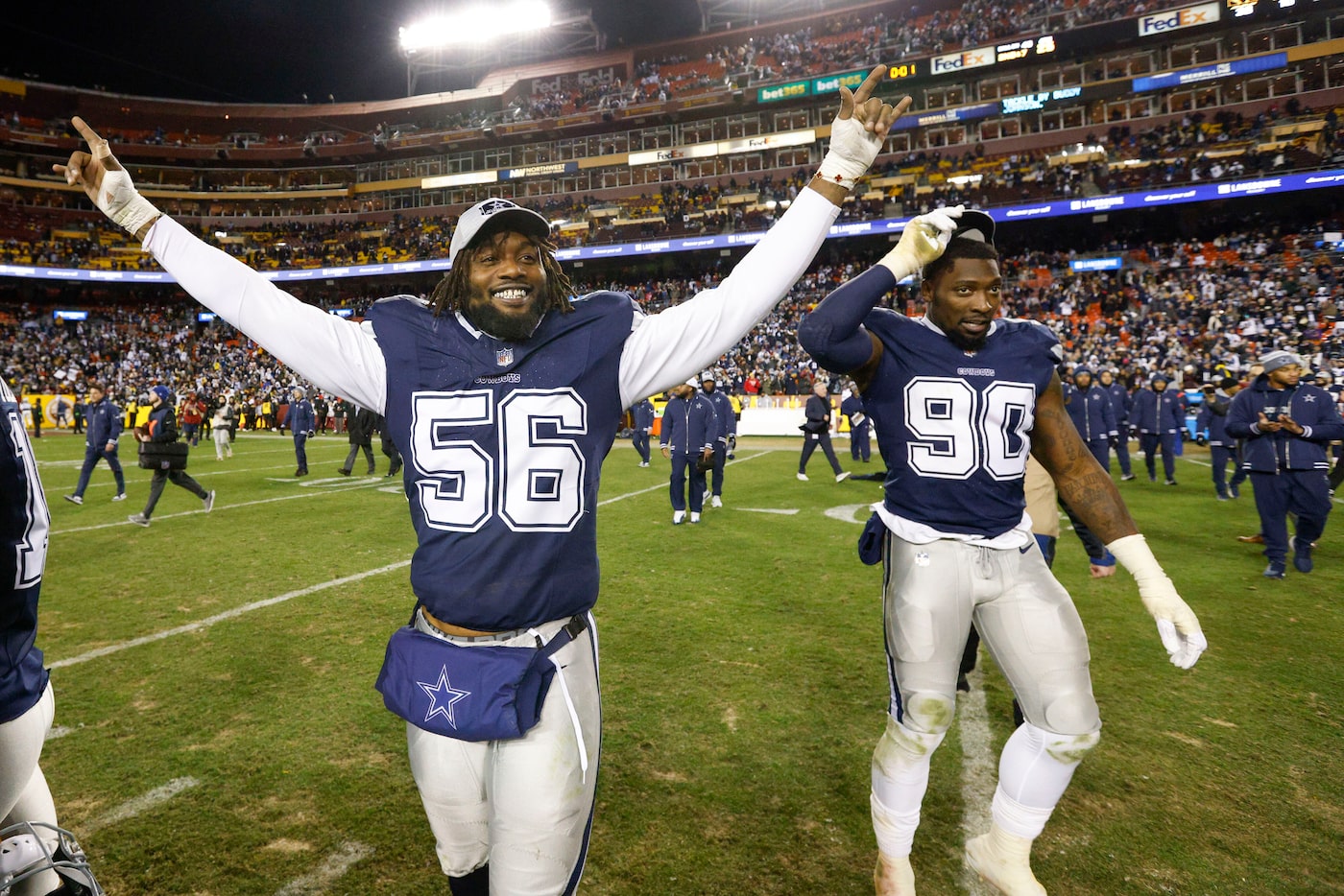 Dallas Cowboys defensive end Dante Fowler Jr. (56) and defensive end DeMarcus Lawrence (90)...