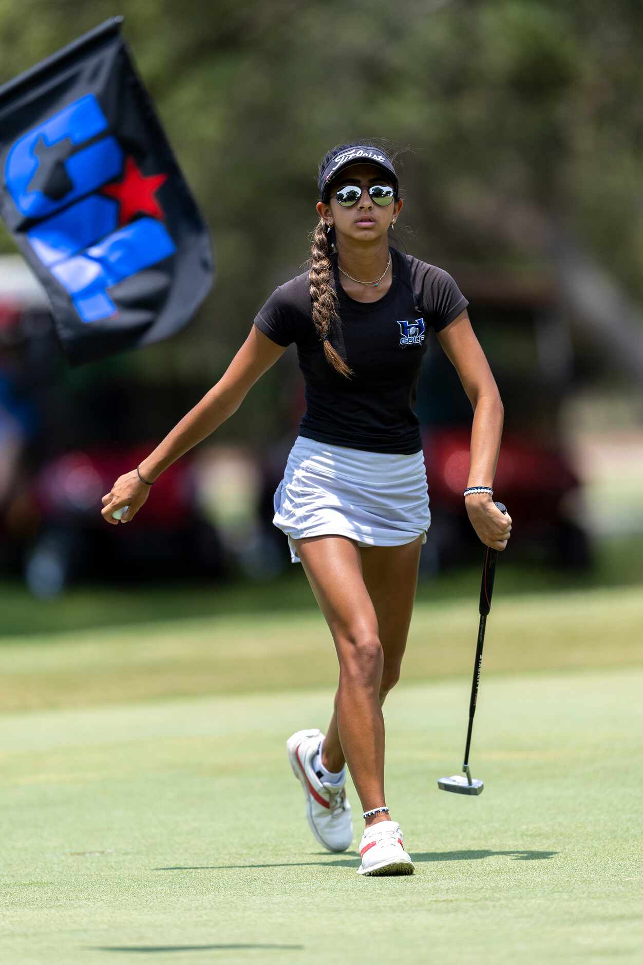 Hebron’s Symran Shah exits the 9th green during the 6A girls state golf tournament in...