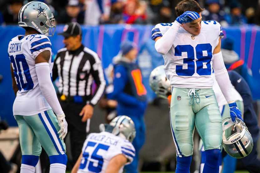 Dallas Cowboys strong safety Jeff Heath (38) turns away as outside linebacker Leighton...
