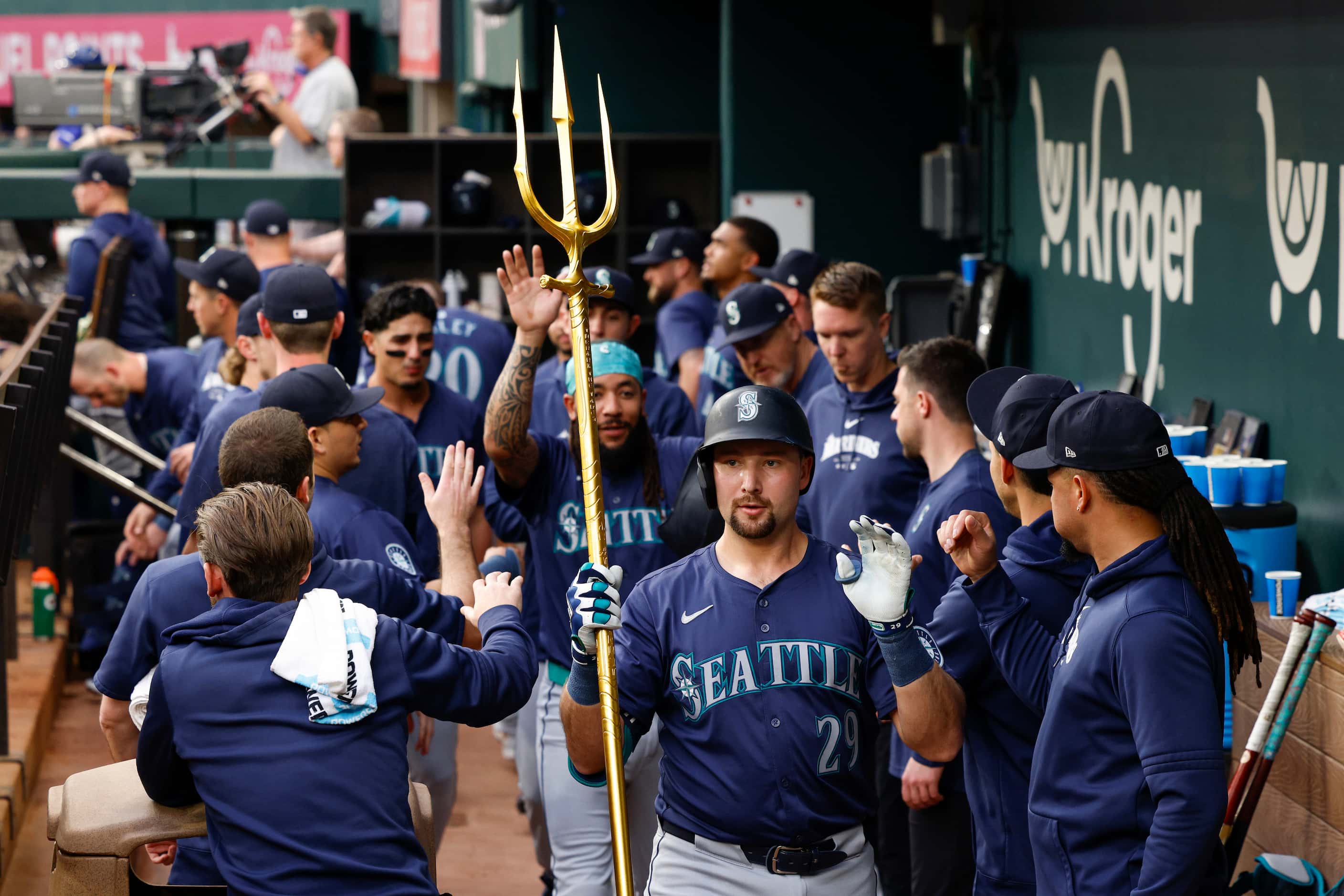 Seattle Mariners catcher Cal Raleigh (29) celebrates his two-run home run with a trident as...