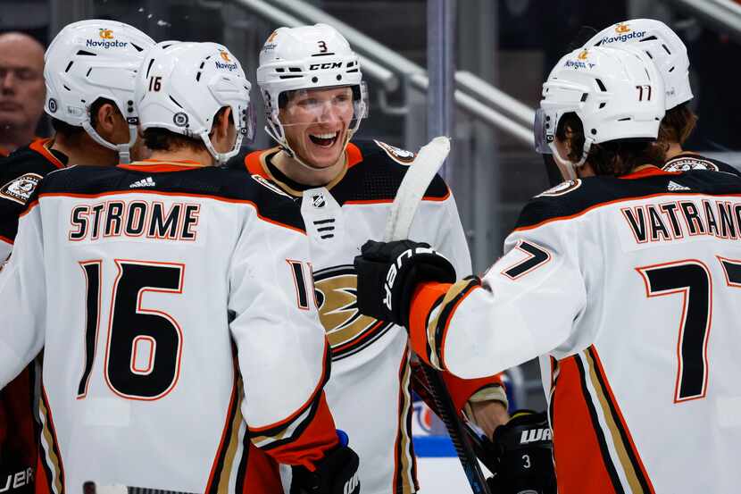 Anaheim Ducks defenseman John Klingberg, center, celebrates with teammates after his winning...