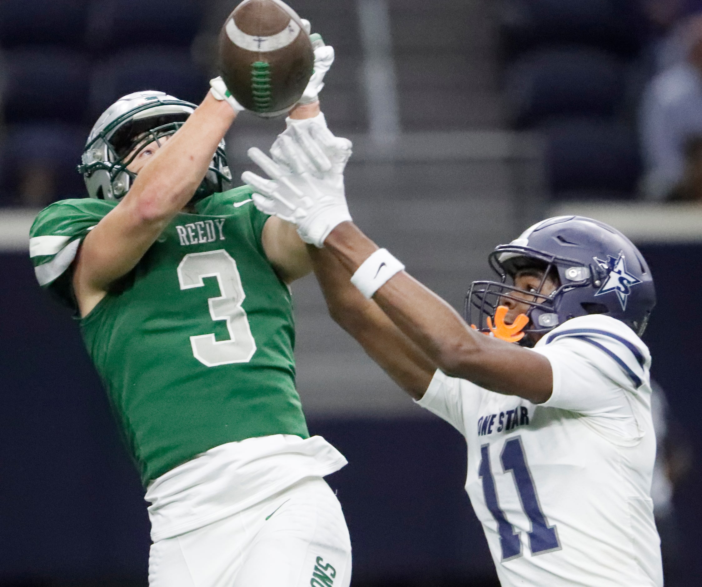 Reedy High School wide receiver Mason Easley (3) was unable to hang onto the ball, defended...