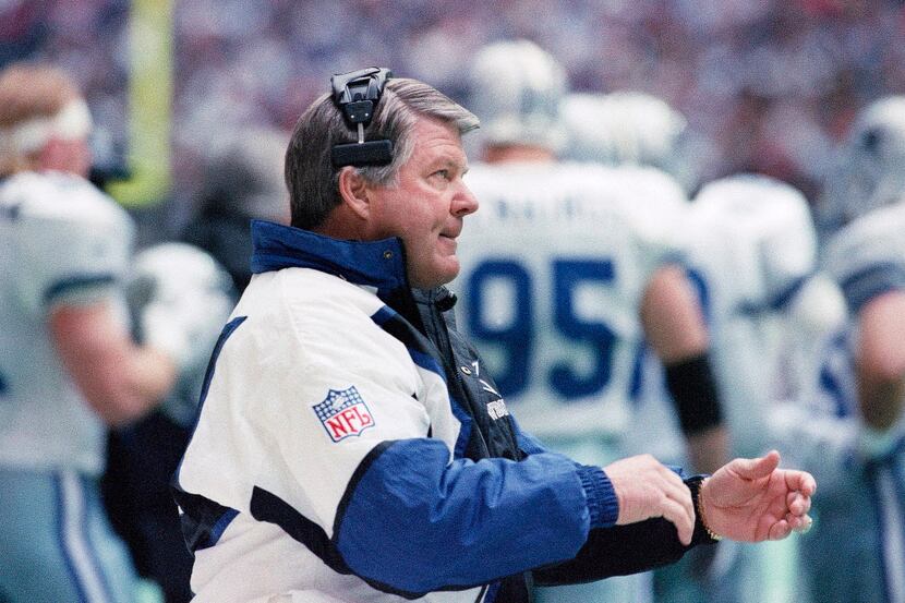 Dallas Cowboys coach Jimmy Johnson cheers on his players in the first quarter against the...