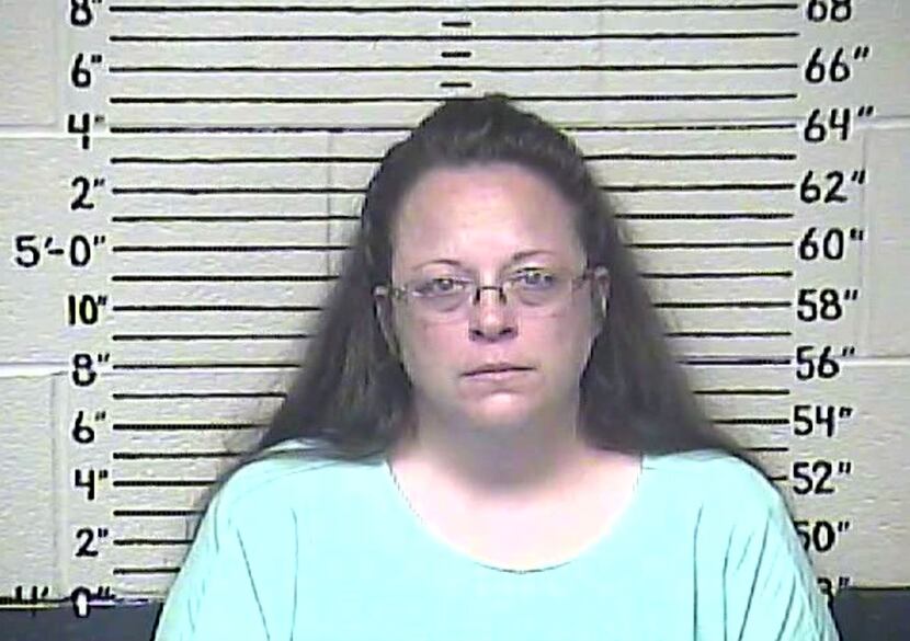 
 “God’s moral law conflicts with my job duties,” Rowan County Clerk Kim Davis said in her...