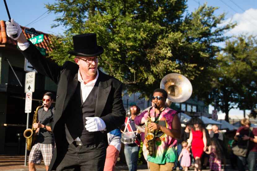 Jason Roberts leads the march through the Bishop Arts District celebrating the death of the...