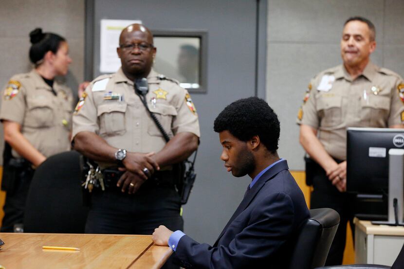 Meechaiel Criner sits alone after his verdict was read Friday. Criner was found guilty of...