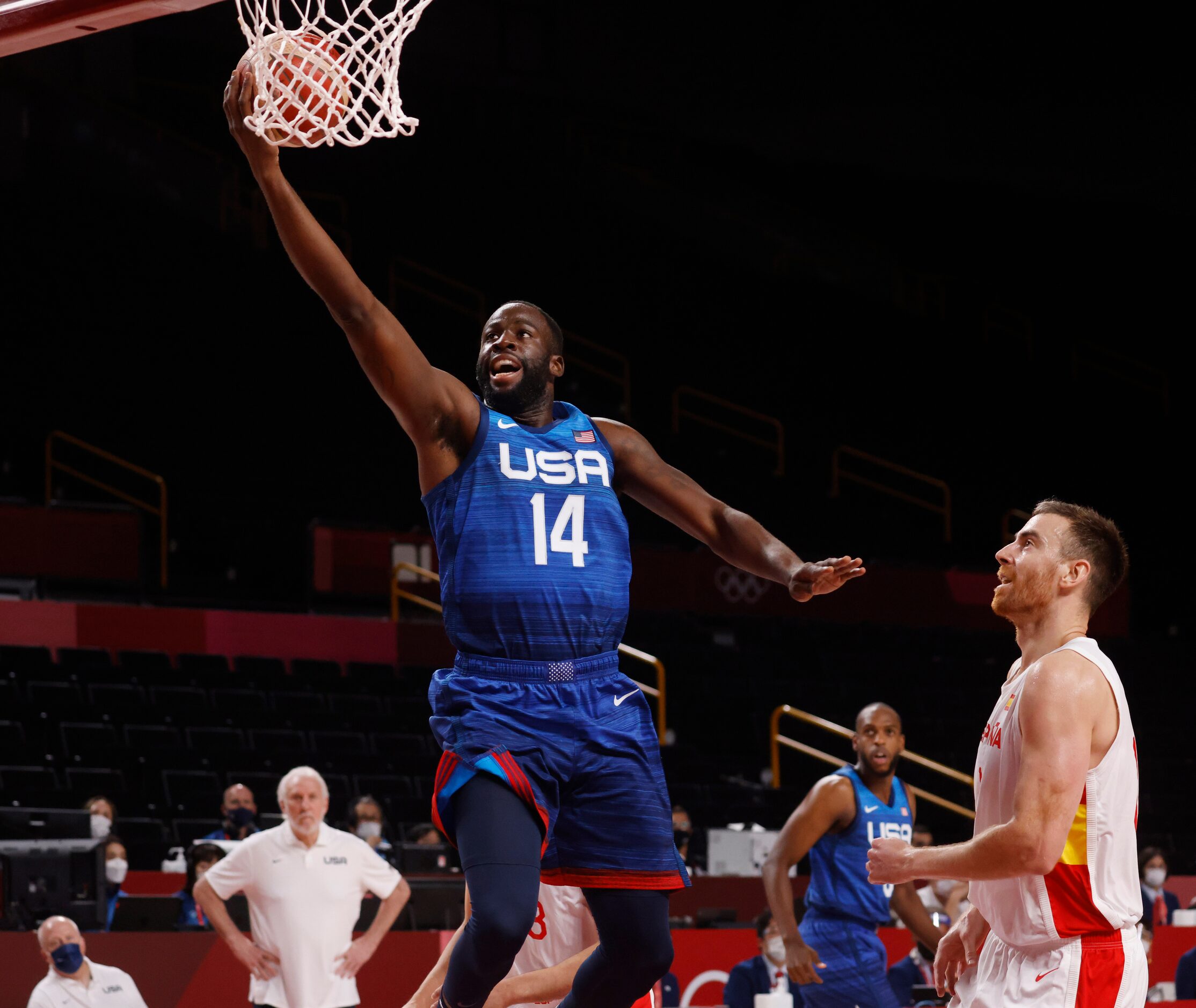 USA’s Draymond Green (14) attempts a layup in a game against Spain during the first half of...