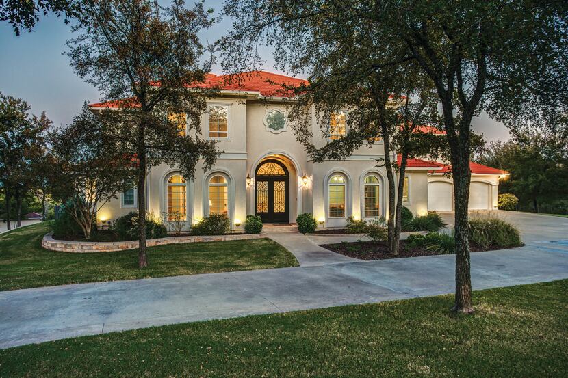 The 2.2-acre custom Mediterranean estate at 9192 Preston Road in Denison is situated in a...