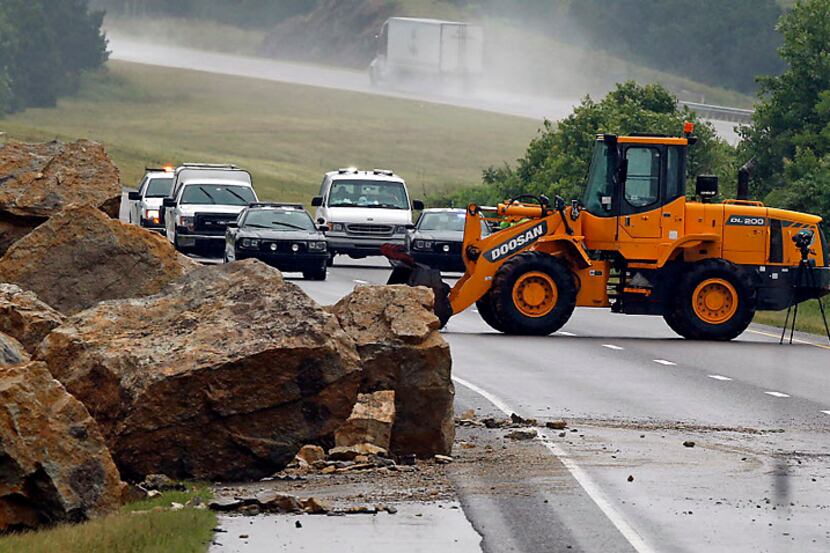 A section of Interstate 35 remains closed at the 50 mile marker in Oklahoma after a rock...