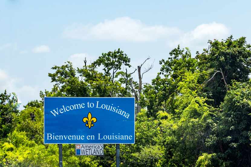 welcome to louisiana sign at the highway