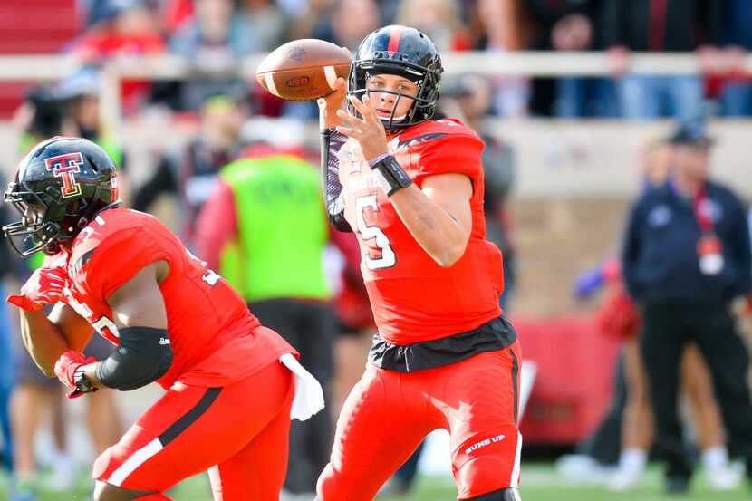 LUBBOCK, TX - NOVEMBER 14: Patrick Mahomes #5 of the Texas Tech Red Raiders looks to pass...