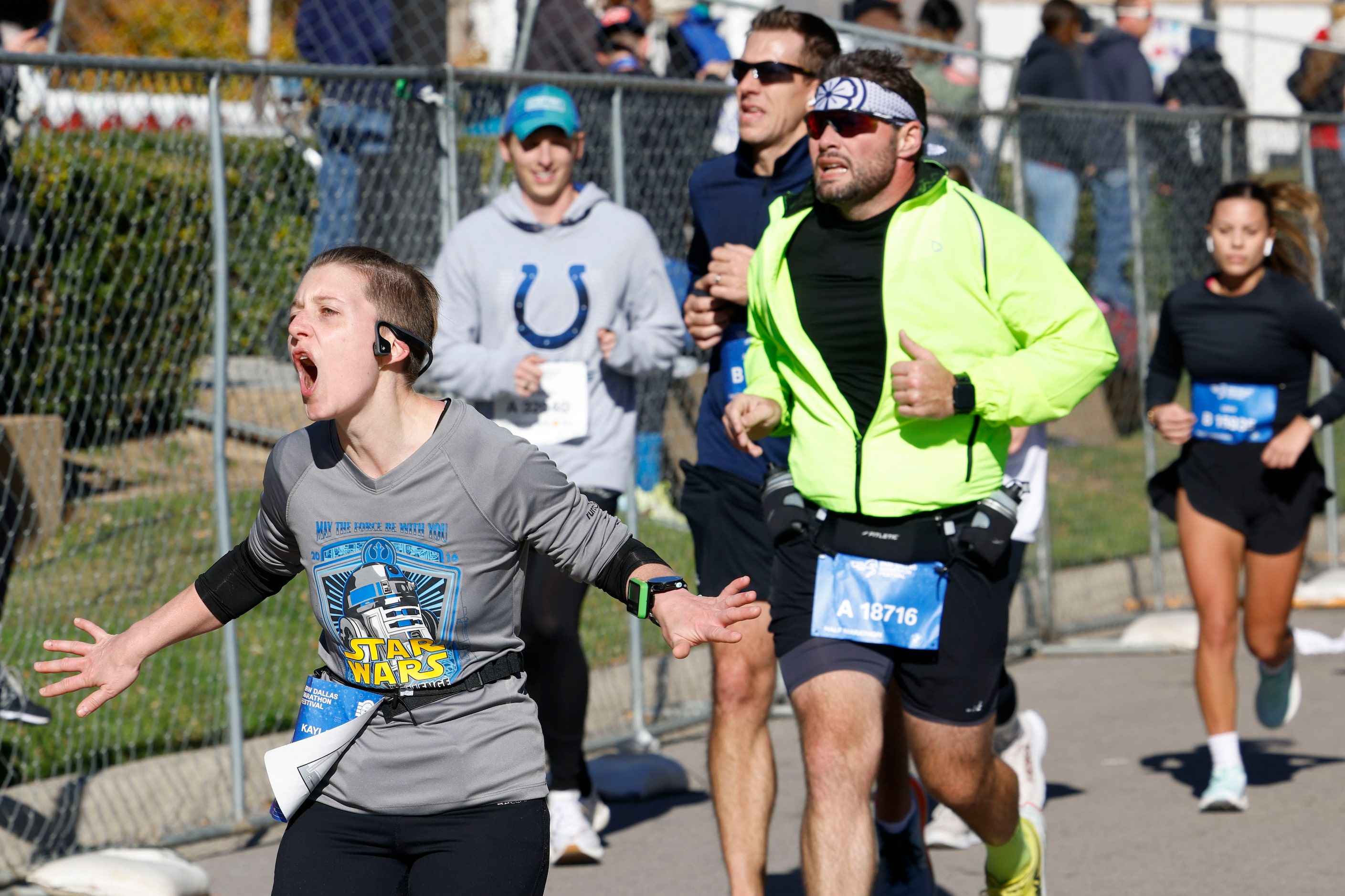 A runner reacts while running during 2023 BMW Dallas Marathon on, Sunday, Dec. 10, 2023, in...