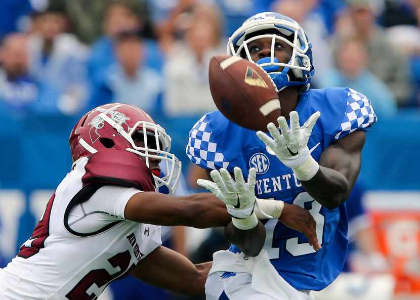 File-THis Sept. 17, 2016, file photo shows Kentucky wide receiver Jeff Badet, right,...