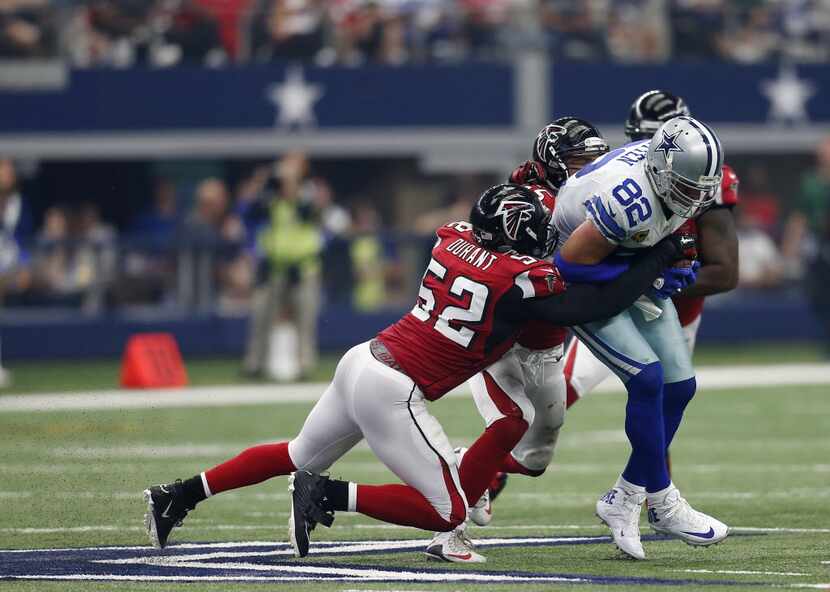 Atlanta Falcons linebacker Justin Durant (52) helps to stop Dallas Cowboys' Jason Witten...