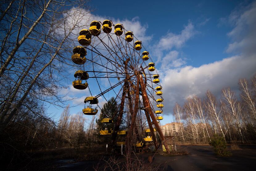 The faded yellow Ferris wheel in Pripyat's amusement park never gave a ride to a single...