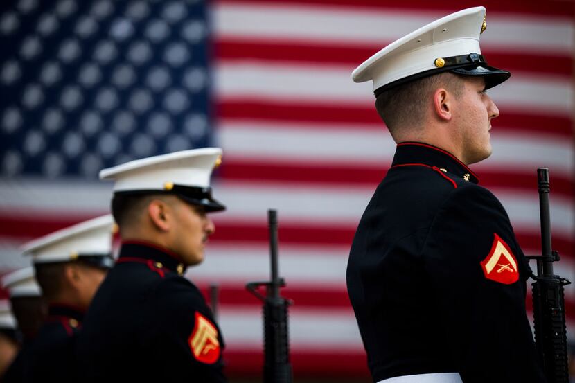 U.S. Marines prepare to give a 21-gun salute during a ceremony before the annual Veterans...